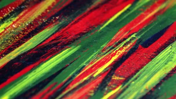 Background from different strokes of red, yellow, green and blue paint - Footage, Video