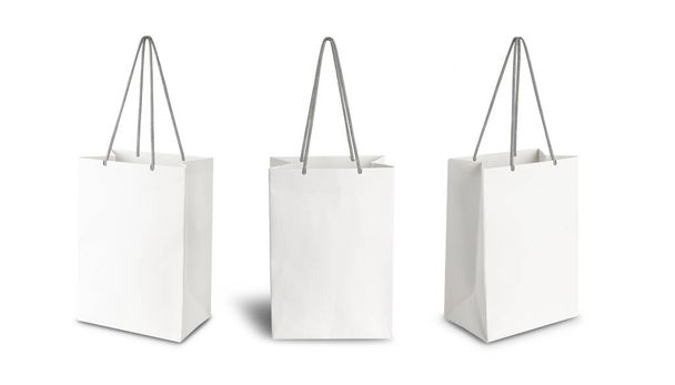 Sada bílé papírové nákupní tašky přední pohled a boční pohled izolované na bílém pozadí s výstřižkem cesta. - Fotografie, Obrázek