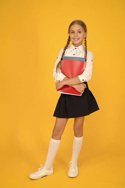 education online while quarantine. learning well bring successful future. knowledge day. childhood development. school girl wear uniform. pretty little girl ready to study. back to school - Фото, изображение