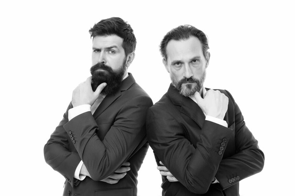 Brainstorming. Serious businessmen isolated on white. Business partners with serious look. Bearded men think with serious faces. Serious and thoughtful - 写真・画像