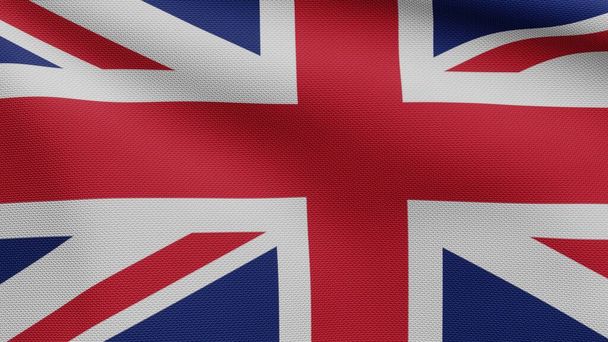 Σημαία του Ηνωμένου Βασιλείου κυματίζει στον άνεμο. Κοντινό πλάνο του βρετανικού πανό φυσάει, μαλακό και λείο μετάξι. Ύφασμα υφάσματος υφή σημάνει φόντο. Χρησιμοποιήστε το για την εθνική ημέρα και χώρα περιπτώσεις έννοια. - Φωτογραφία, εικόνα