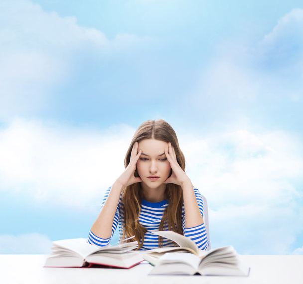 Stressed student girl with books - Fotografie, Obrázek