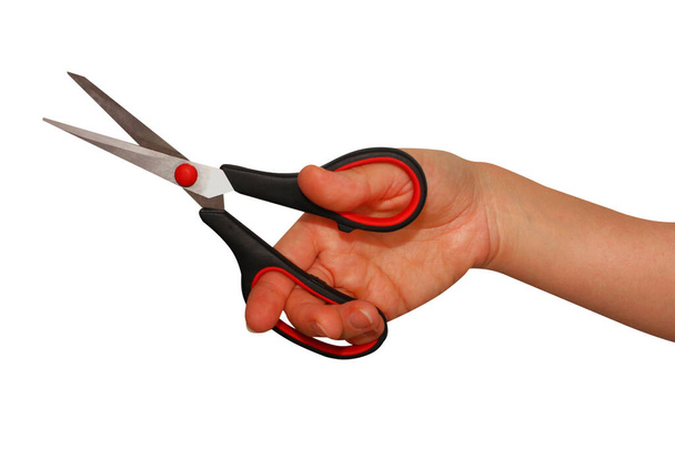 hand with black scissors isolated on white background - Zdjęcie, obraz
