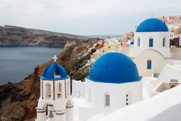 Blue domes of churches in Oia, Santorini, Greece - Foto, immagini
