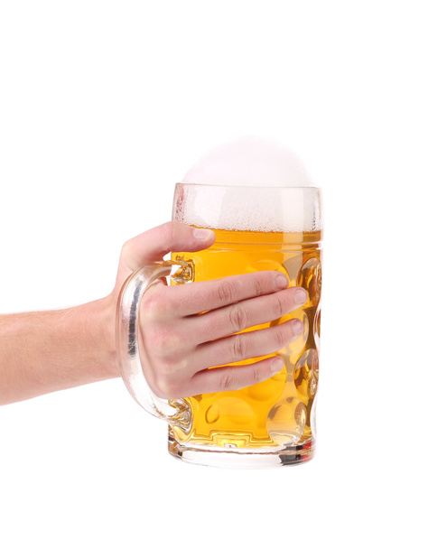 Hand with a beer glass. - Photo, Image