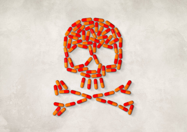 Skull made of orange capsule pills isolated on white concrete background. 3D illustration - Φωτογραφία, εικόνα