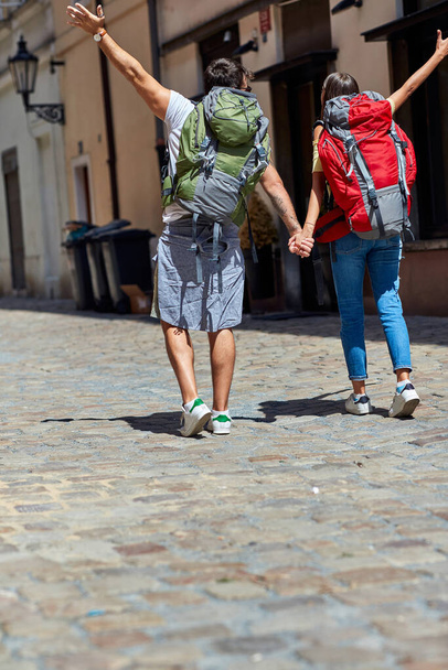 Tourist couple sightseeing in Prague; Traveller lifestyle - Photo, Image