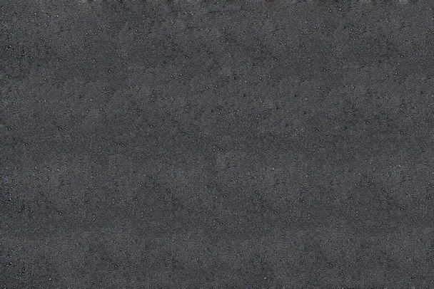 Textura de asfalto - Vista superior y primer plano de un fragmento de un antiguo camino de asfalto - Foto, imagen