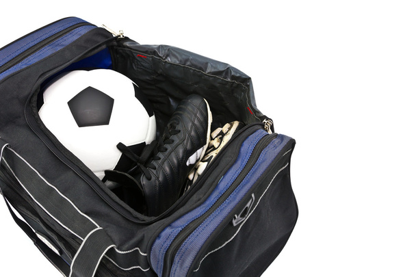 Botas de futebol e futebol em saco desportivo
 - Foto, Imagem