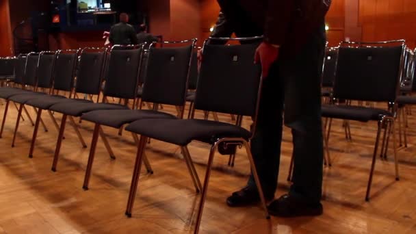 Conference hall seats getting ready - Footage, Video