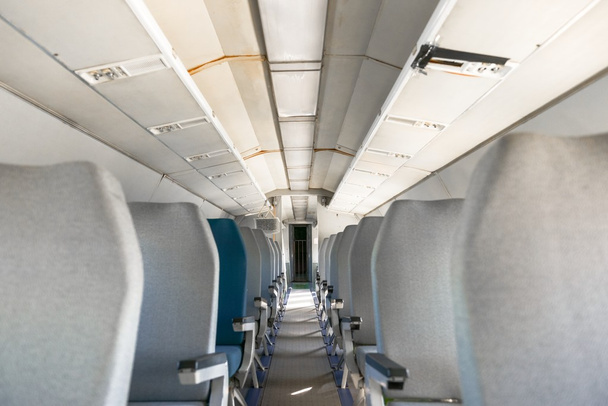 Interior of an airplane with many seats - Photo, Image