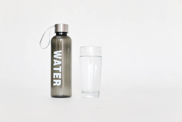A bottle of clean drinking water - Фото, изображение