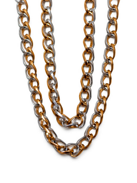 Jewelry chain made of yellow and white metal isolated on a white background - Photo, Image