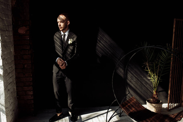 young handsome  groom posing indoors - Foto, Imagen