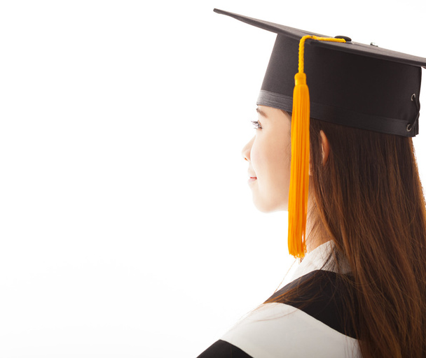 bonita graduación femenina está pensando en el futuro
  - Foto, Imagen