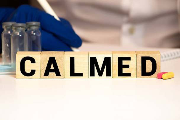 CALMED word made with building blocks, concept - Photo, Image