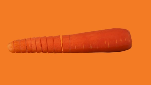 Looping animación de una zanahoria siendo picado en pedazos - Metraje, vídeo