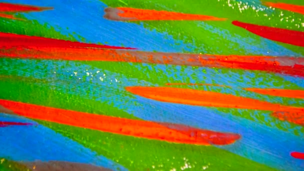 Muchas líneas de colores diferentes pintados pintura brillante sobre lienzo de cerca. - Metraje, vídeo