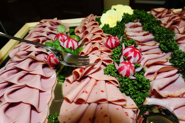 a platter of cold meats as snacks in food catering - Photo, Image
