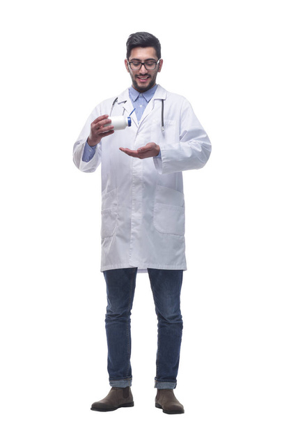 smiling doctor with hand sanitizer . isolated on a white background. - Photo, Image