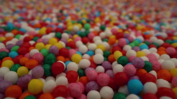 Kleurrijke macro snoepgoed hagelslag beweging achtergrond - Video