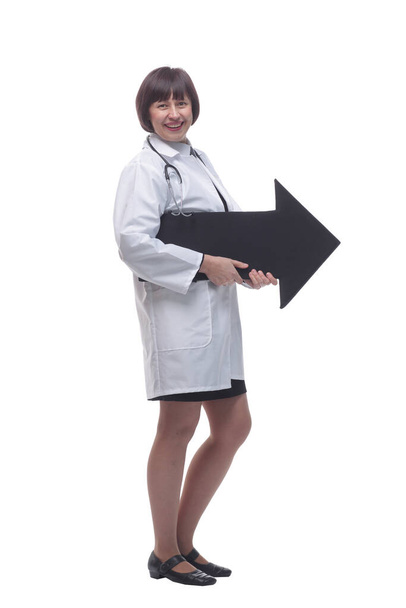 female doctor with an arrow pointing in the right direction. - Fotoğraf, Görsel