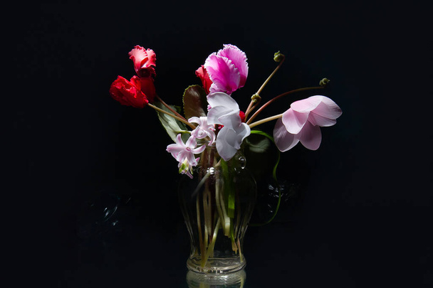 a bouquet of flowers in a vase on a rough background! Delicate spring flowers - Fotoğraf, Görsel