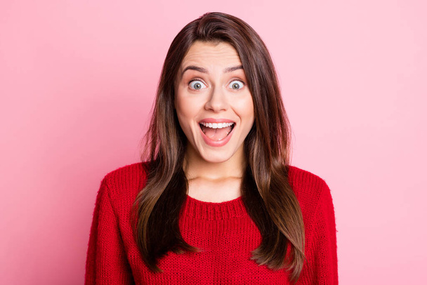 Portrait photo of amazed happy surprised brunette girl staring with opened mouth smiling wearing knitted sweater isolated on pink color background - Photo, Image