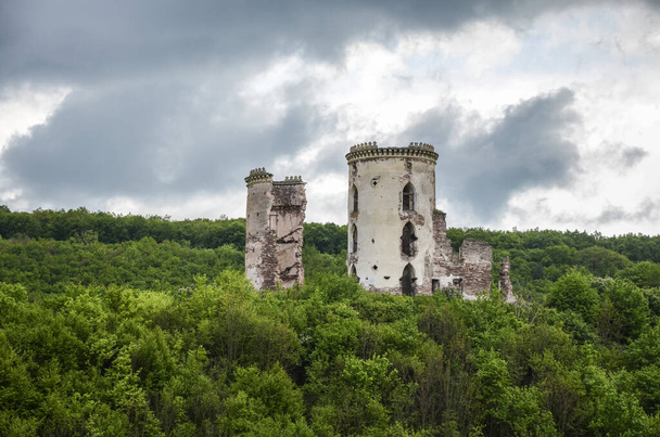 The ruins tower of an old abandoned castle in the village of Chervonograd, Ternopil region, Ukraine - Photo, Image