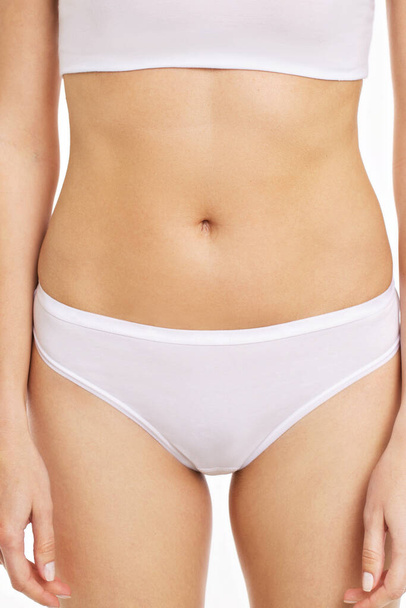 beautiful slim female waist on a white background - Фото, зображення