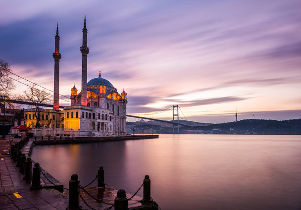 ISTANBUL, TURKEY. Beautiful Istanbul sunrise landscape with colored clouds. Istanbul Bosphorus Bridge (15 July Martyrs Bridge. Turkish: 15 Temmuz Sehitler Koprusu). - Photo, Image