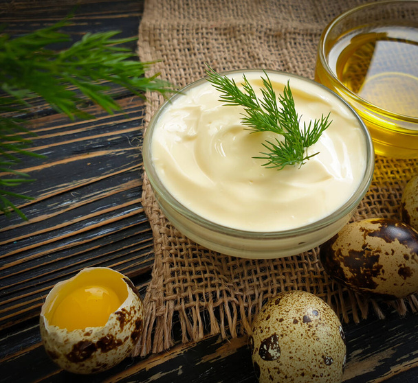 homemade mayonnaise, quail eggs on wooden background - Photo, Image