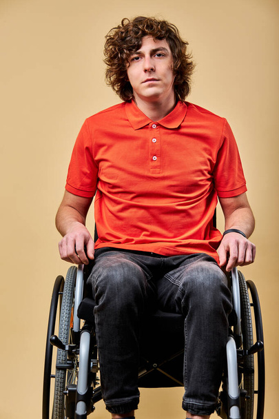 sad disabled person on wheelchair is looking upset - 写真・画像