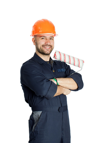 builder with roller for painting isolated on white background - Photo, Image