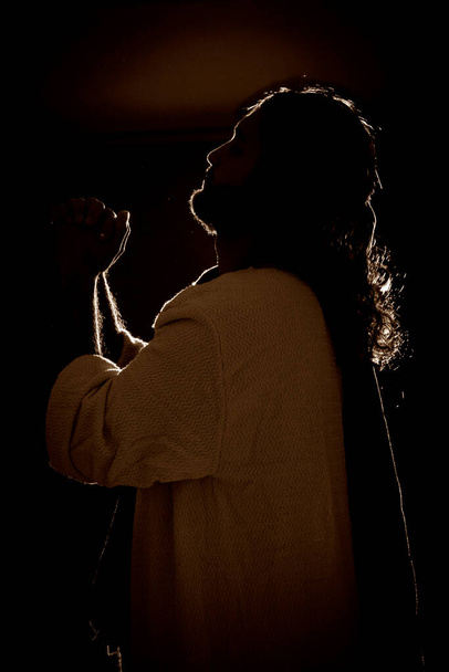 Jesus Christ praying at night to the Father - Foto, afbeelding