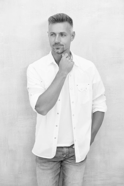 Handsome man perfect white shirt denim pants, stain remover concept - Valokuva, kuva