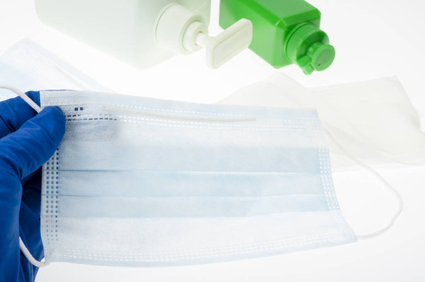 Coronavirus prevention medical masks, sanitizer gel, liquid soap for hand hygiene corona virus protection. Studio Photo - Фото, зображення