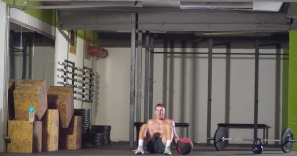 Man resting after training with medicine ball - Footage, Video
