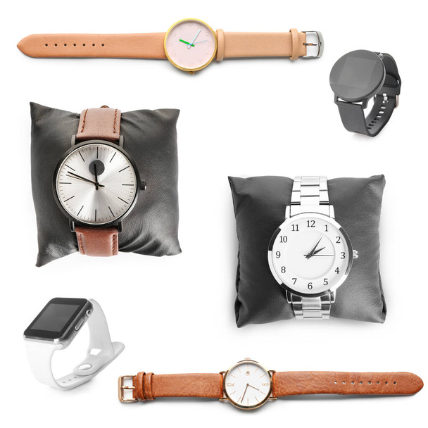 Różne zegarki na nadgarstku na białym tle - Zdjęcie, obraz