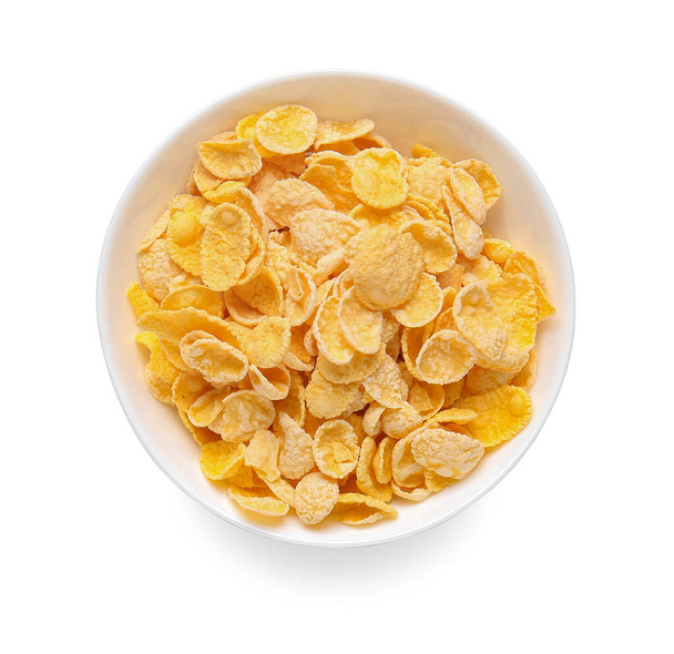 Tasty breakfast cereals in bowl on white background - Photo, image