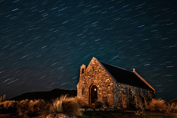 A starry sky over the Church of the Good Shepherd in Tekapo - Fotó, kép