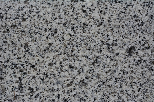 SANTIAGO DE COMPOSTEL, SPAIN - Feb 06, 2021: Clear granite stone texture background image. - Foto, afbeelding