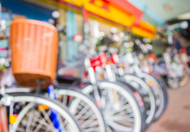 imagen de desenfoque tienda de bicicletas con bokeh para el uso de fondo. - Foto, Imagen