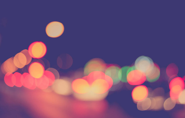 Abstract blurred Street Bokeh colorido à noite para uso em segundo plano. (tom vintage) - Foto, Imagem