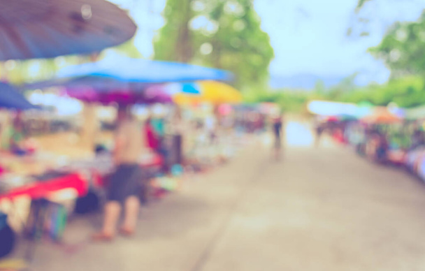 Abstract blur image of day market on street for background usage. (винтажный тон)) - Фото, изображение