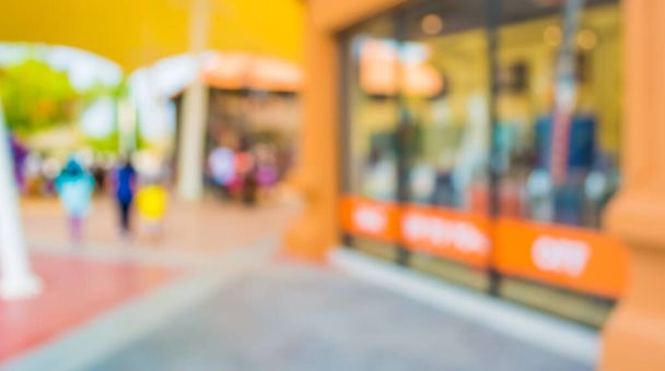 Imagen de fondo borrosa abstracta de la gente comprando y caminando en la calle comercial . - Foto, imagen