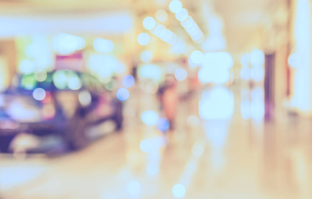 Abstract blur image of car showroom for background. - Photo, Image