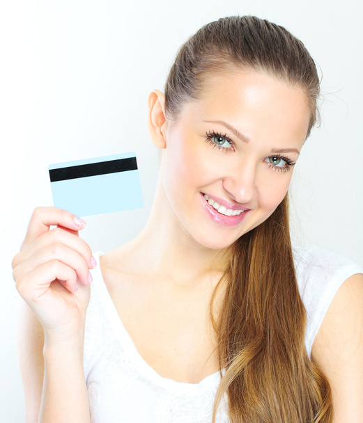 Business woman holding credit card - Фото, изображение
