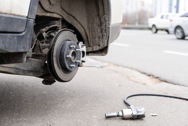 car brake part at garage,car brake disc without wheels closeup - Photo, Image
