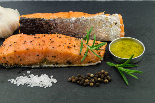 Salted Stripe of Atlantic ocean Salmon peppered and hot smoked - Photo, Image